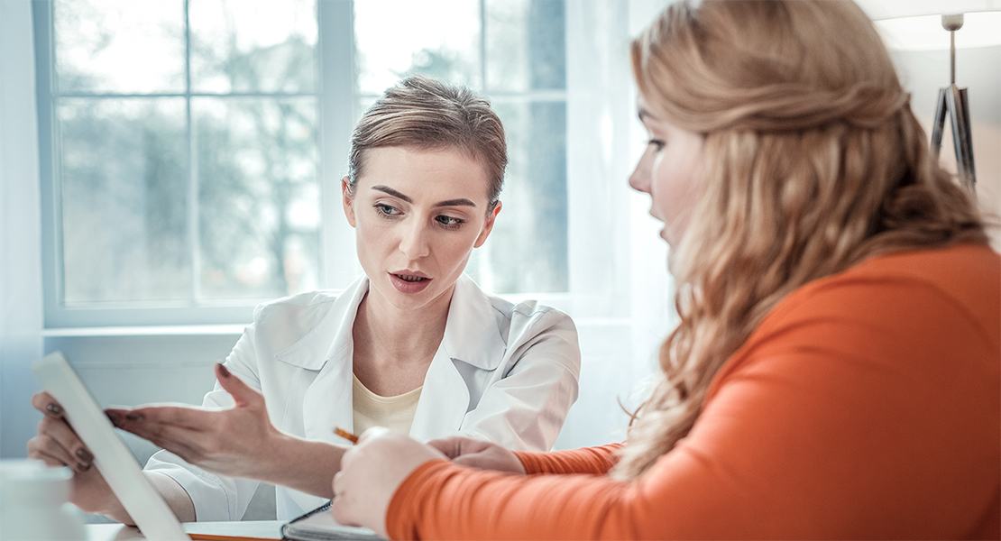 Doctor talking to patient